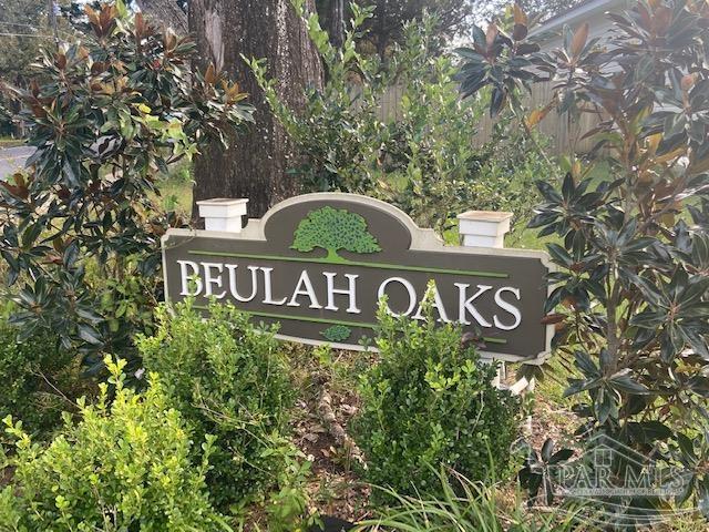 8486 Beech Tree Road Pensacola, FL 32526 - Photo 4 of 5 a close up of a street sign
