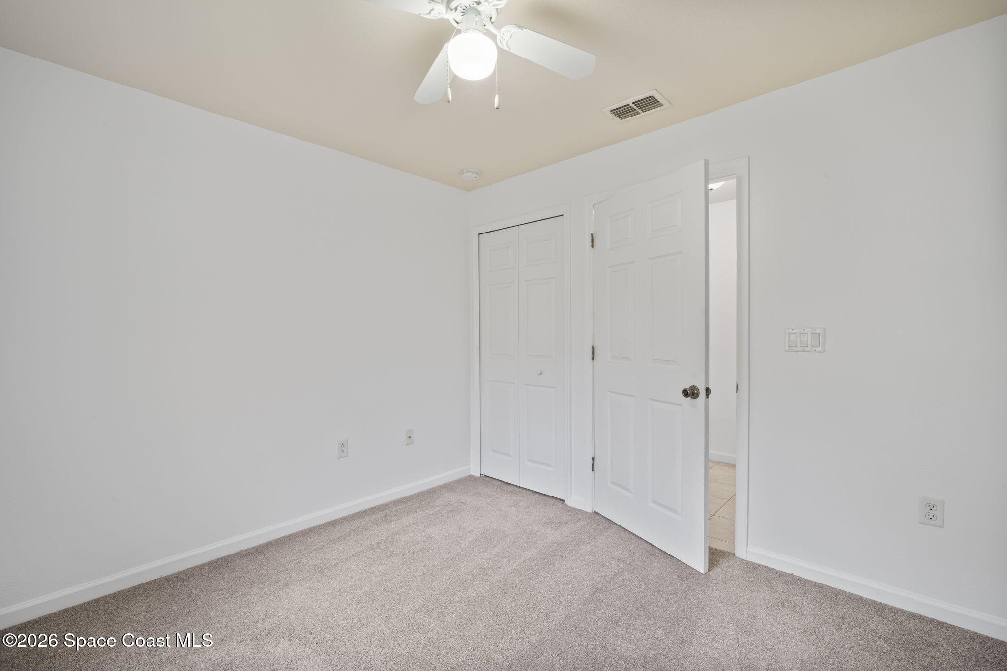 4555 Radiant Way, Unit 103 Melbourne, FL 32901 - Photo 25 of 58 a view of an empty room