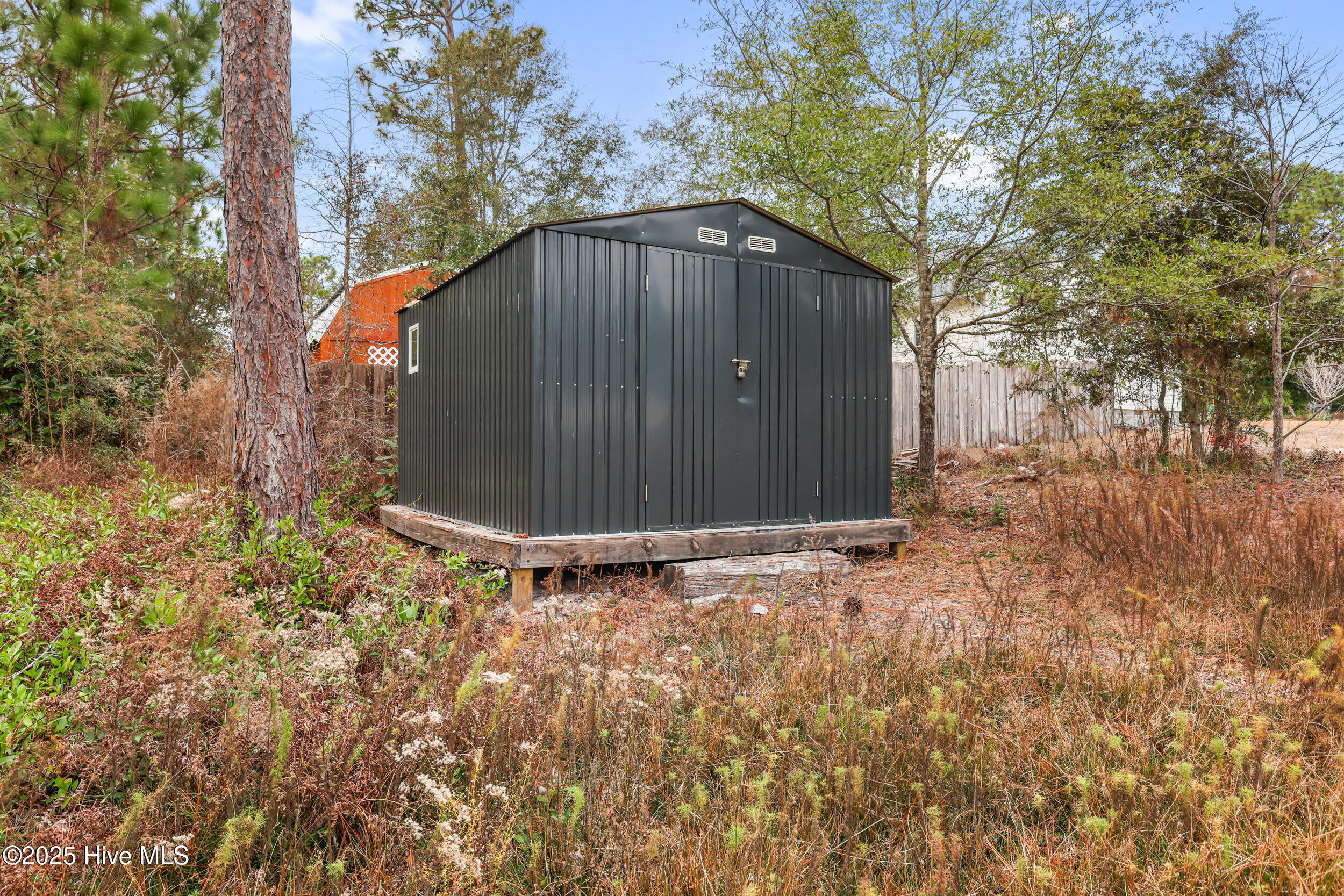 60 Greensboro Road Southport, NC 28461 - Photo 25 of 42 Storage shed