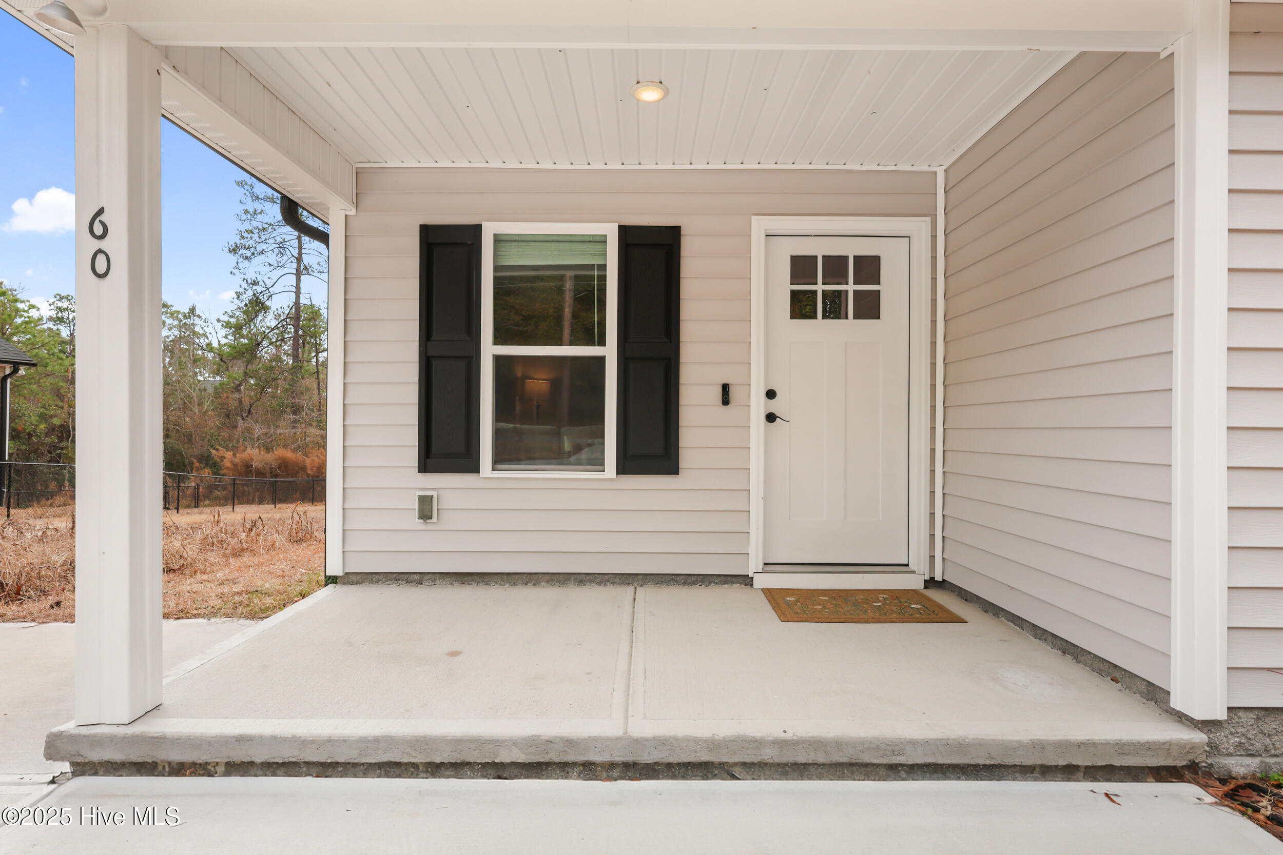 60 Greensboro Road Southport, NC 28461 - Photo 5 of 42 Front covered porch