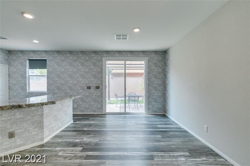 5475 Ordesa Valley Road Las Vegas, NV 89148 - Photo 27 of 35 Sliding glass doors offer seamless access to a private outdoor patio space.