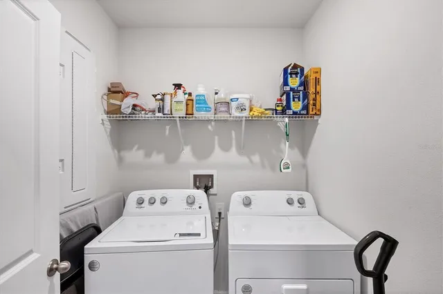 a utility room with dryer and washer