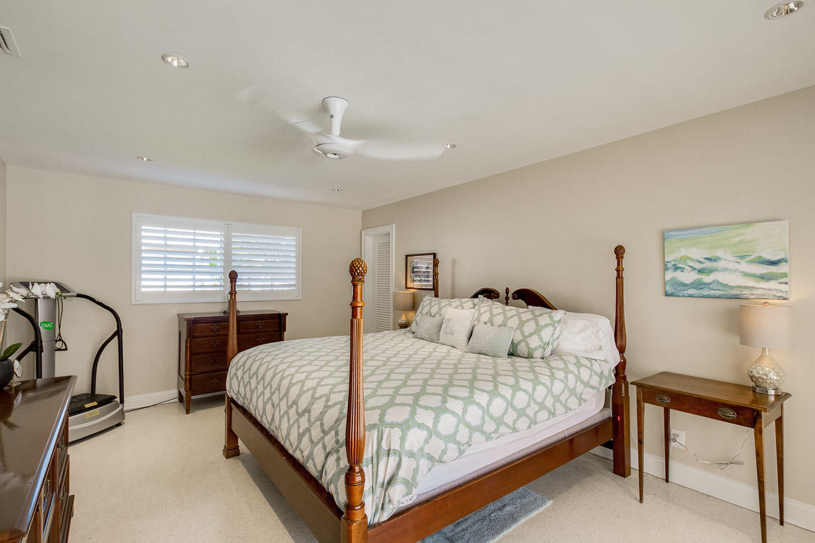 601 Southwest 1st Street Boca Raton, FL 33486 - Photo 16 of 32 a bedroom with a bed and a window