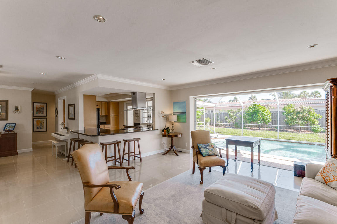 601 Southwest 1st Street Boca Raton, FL 33486 - Photo 3 of 32 a living room with furniture and a large window
