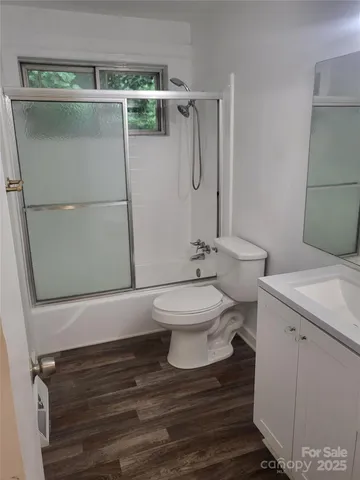a bathroom with a toilet and a sink