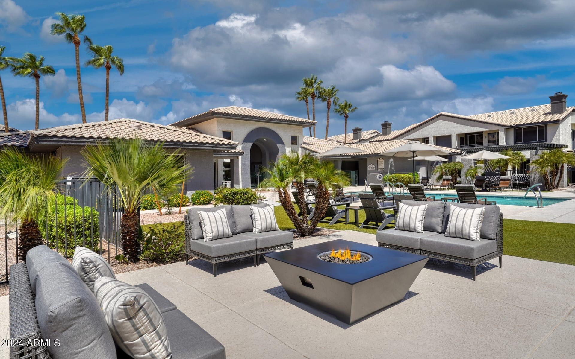 3625 East Ray Road, Unit 1 Phoenix, AZ 85044 - Photo 21 of 29 a building outdoor space with patio furniture