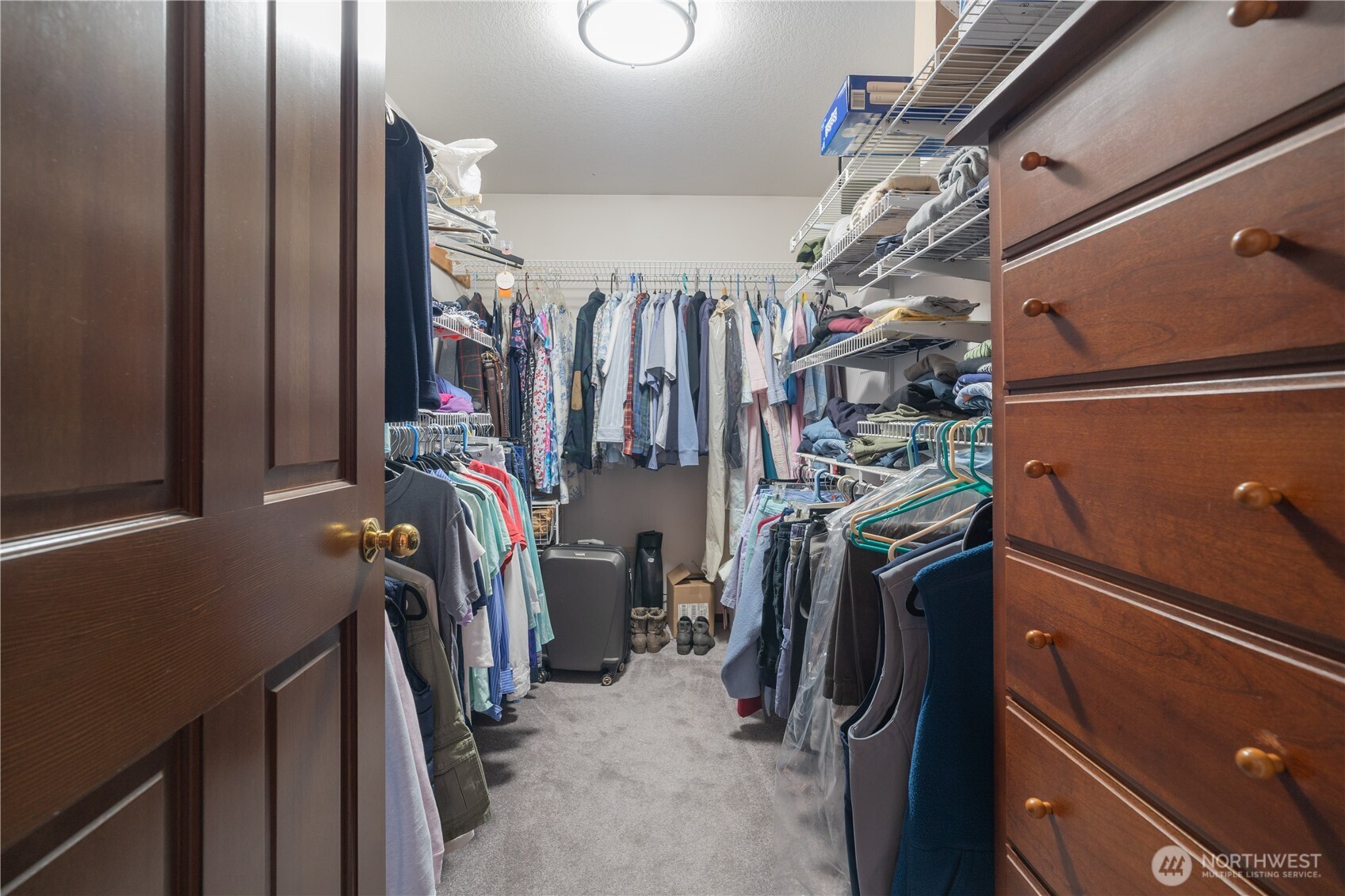 2102 Mark Street Northeast Olympia, WA 98516 - Photo 25 of 37 a view of walk in closet with clothes