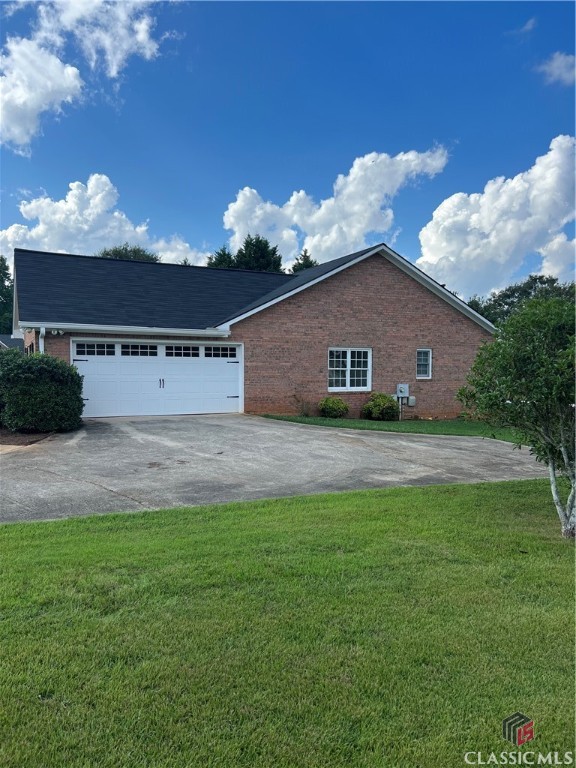 105 Yorkshire Road Bogart, GA 30622 - Photo 2 of 48 2 car garage with extra parking