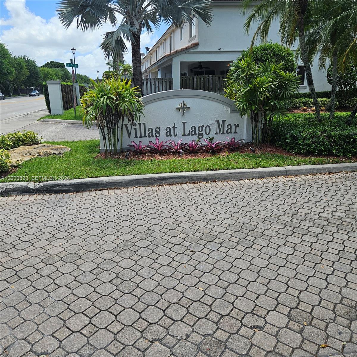 7378 Southwest 162nd Place Miami, FL 33193 - Photo 1 of 37 a sign that is on the side of a building