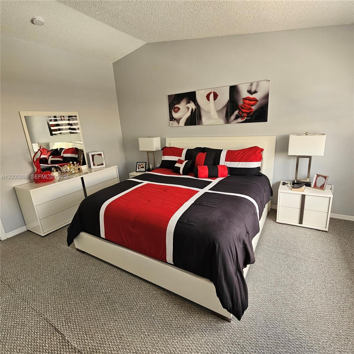 7378 Southwest 162nd Place Miami, FL 33193 - Photo 27 of 37 a bedroom with a bed and closet