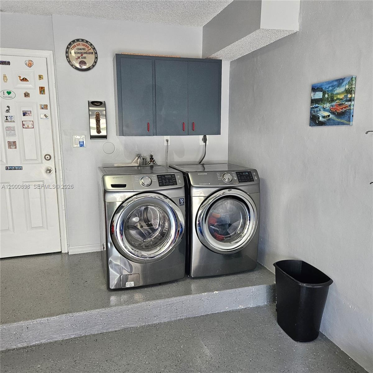 7378 Southwest 162nd Place Miami, FL 33193 - Photo 33 of 37 a view of washer and dryer