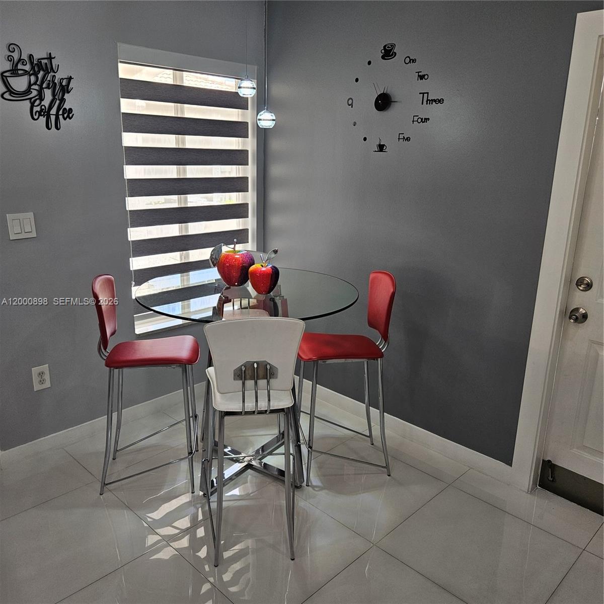 7378 Southwest 162nd Place Miami, FL 33193 - Photo 9 of 37 a room with furniture and a window