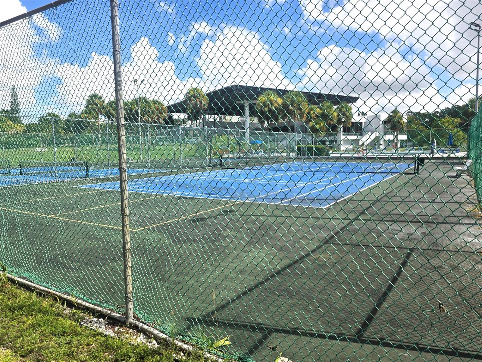 3821 Environ Boulevard, Unit 610 Lauderhill, FL 33319 - Photo 19 of 19 a view of a tennis court