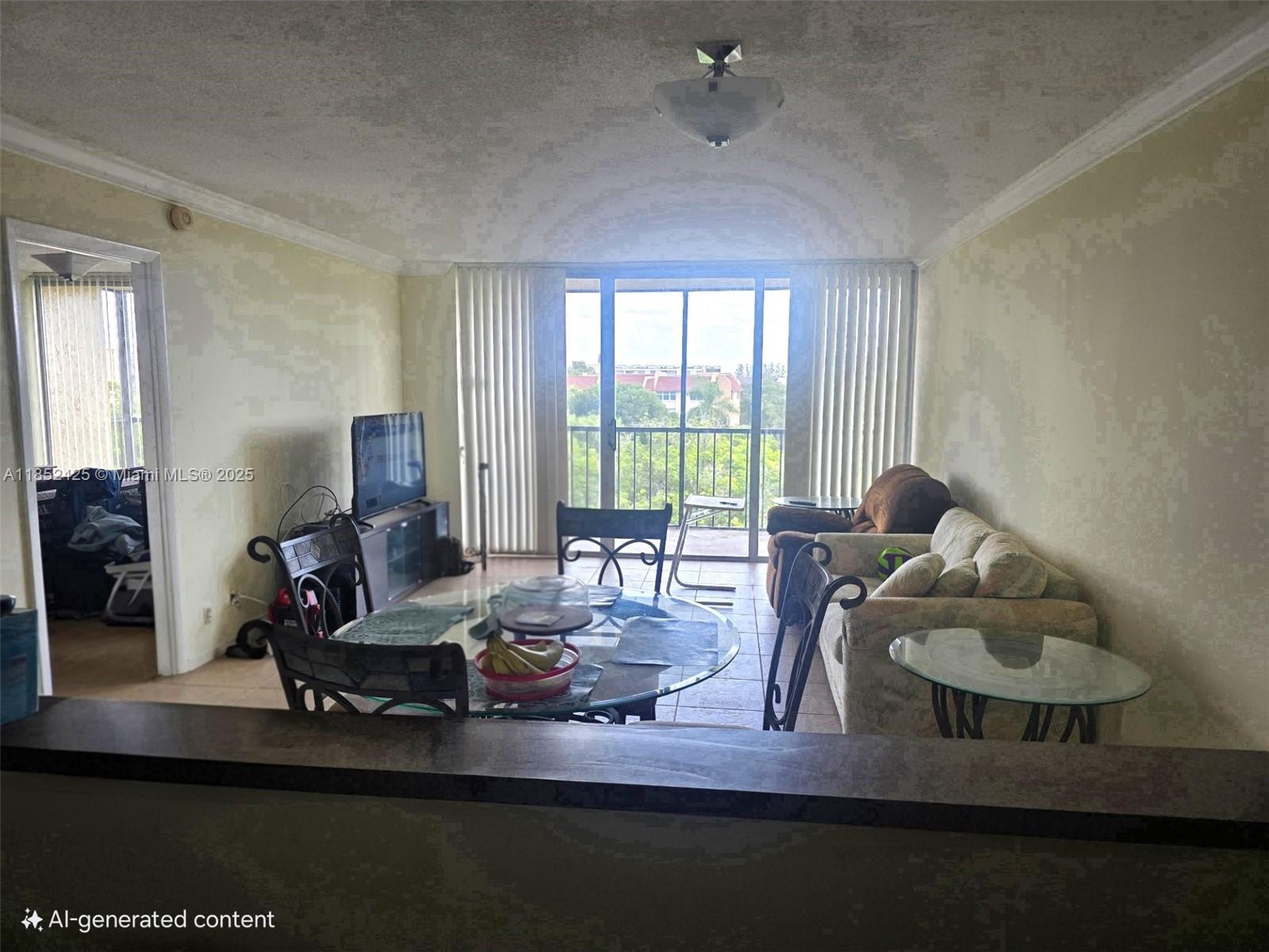 3821 Environ Boulevard, Unit 610 Lauderhill, FL 33319 - Photo 2 of 19 a living room with furniture and a floor to ceiling window
