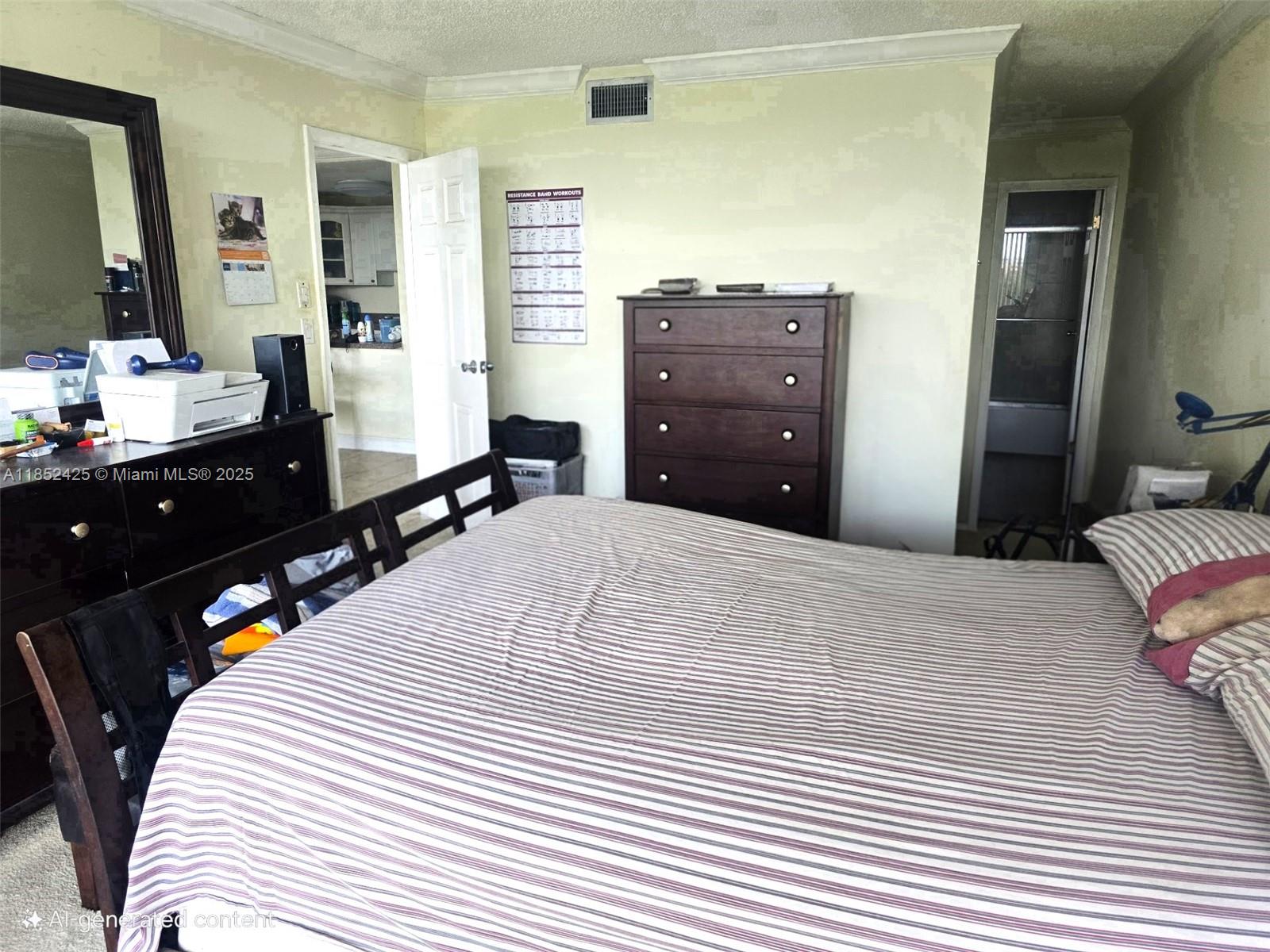3821 Environ Boulevard, Unit 610 Lauderhill, FL 33319 - Photo 6 of 19 a bedroom with a bed and a dresser