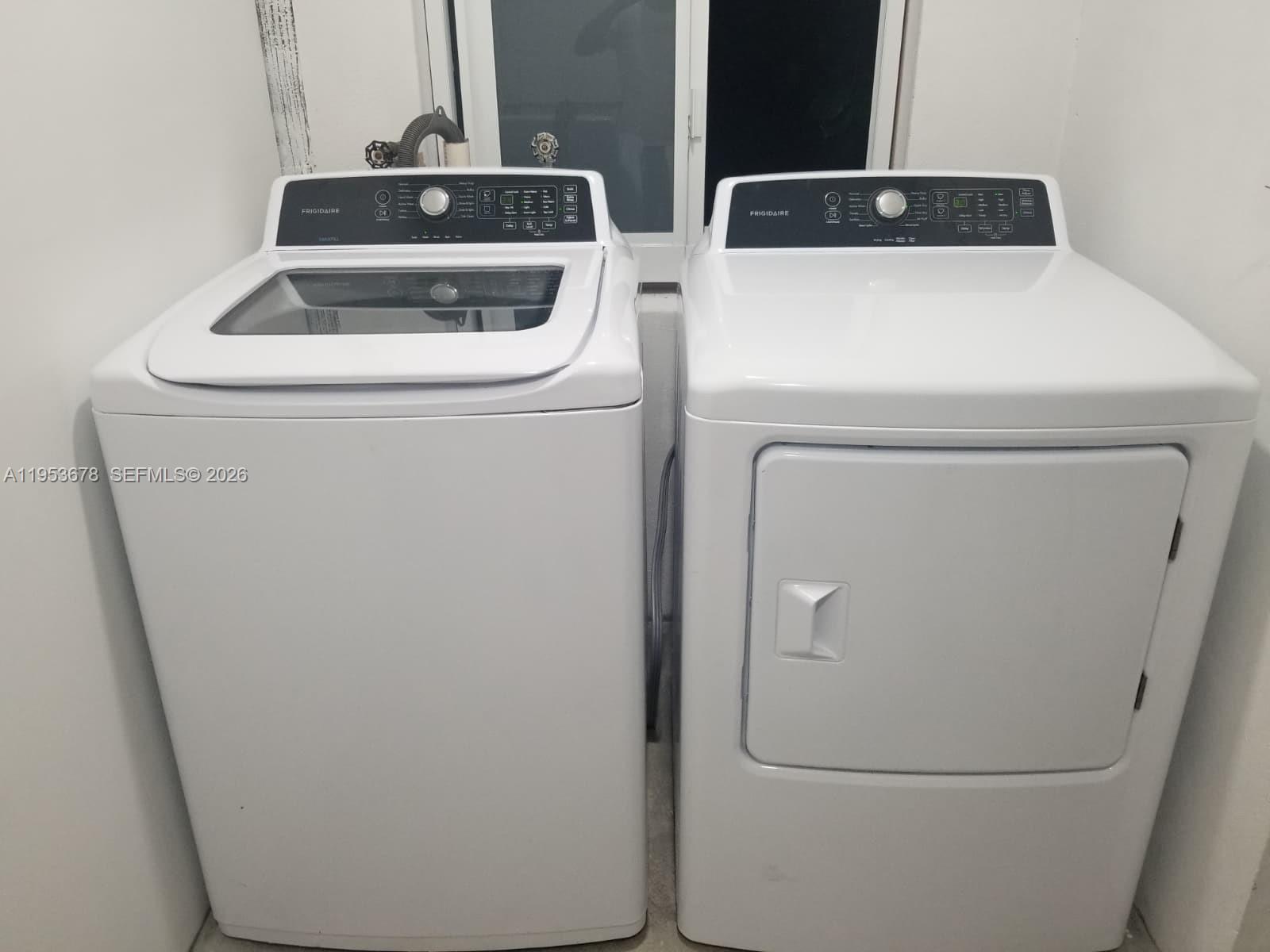 2355 Northwest 9th Street Miami, FL 33125 - Photo 15 of 16 a utility room with dryer and washer