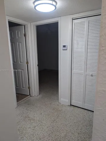 an empty room with closet
