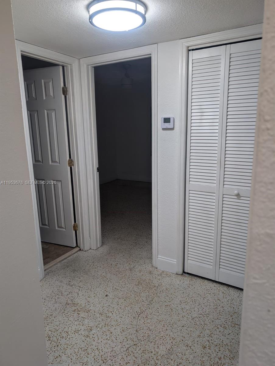 2355 Northwest 9th Street Miami, FL 33125 - Photo 7 of 16 an empty room with closet