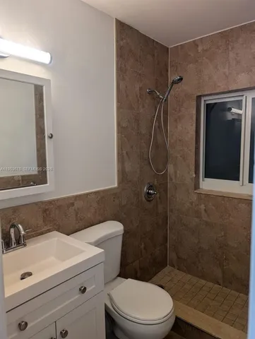 an empty room with a empty space and window