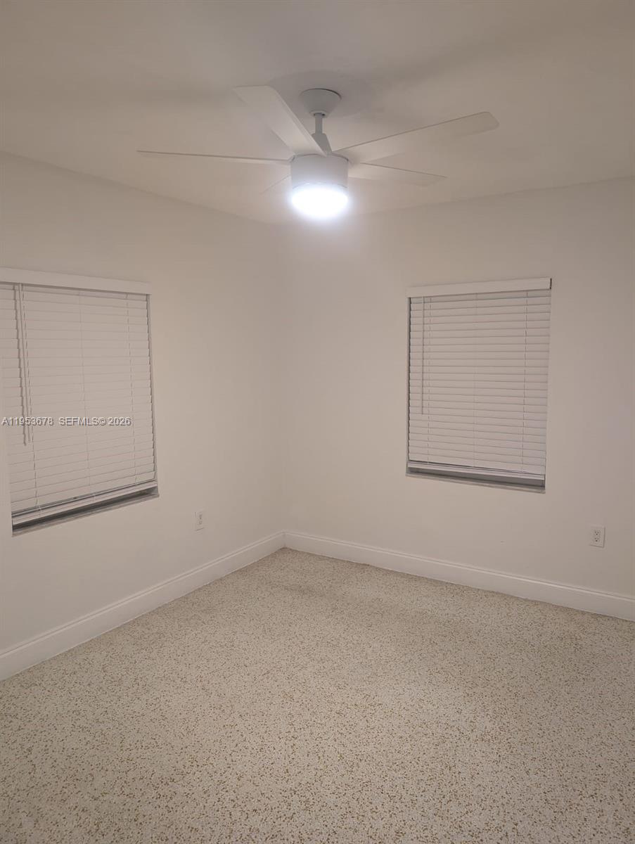 2355 Northwest 9th Street Miami, FL 33125 - Photo 10 of 16 an empty room with a empty space and window