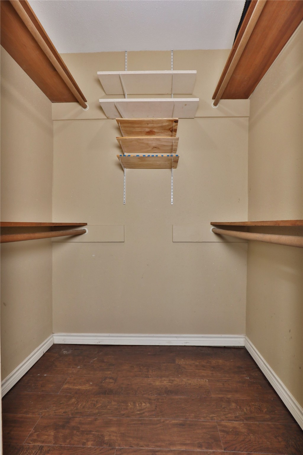 3 Ranch House Loop Angleton, TX 77515 - Photo 17 of 25 a view of a room with wooden floor
