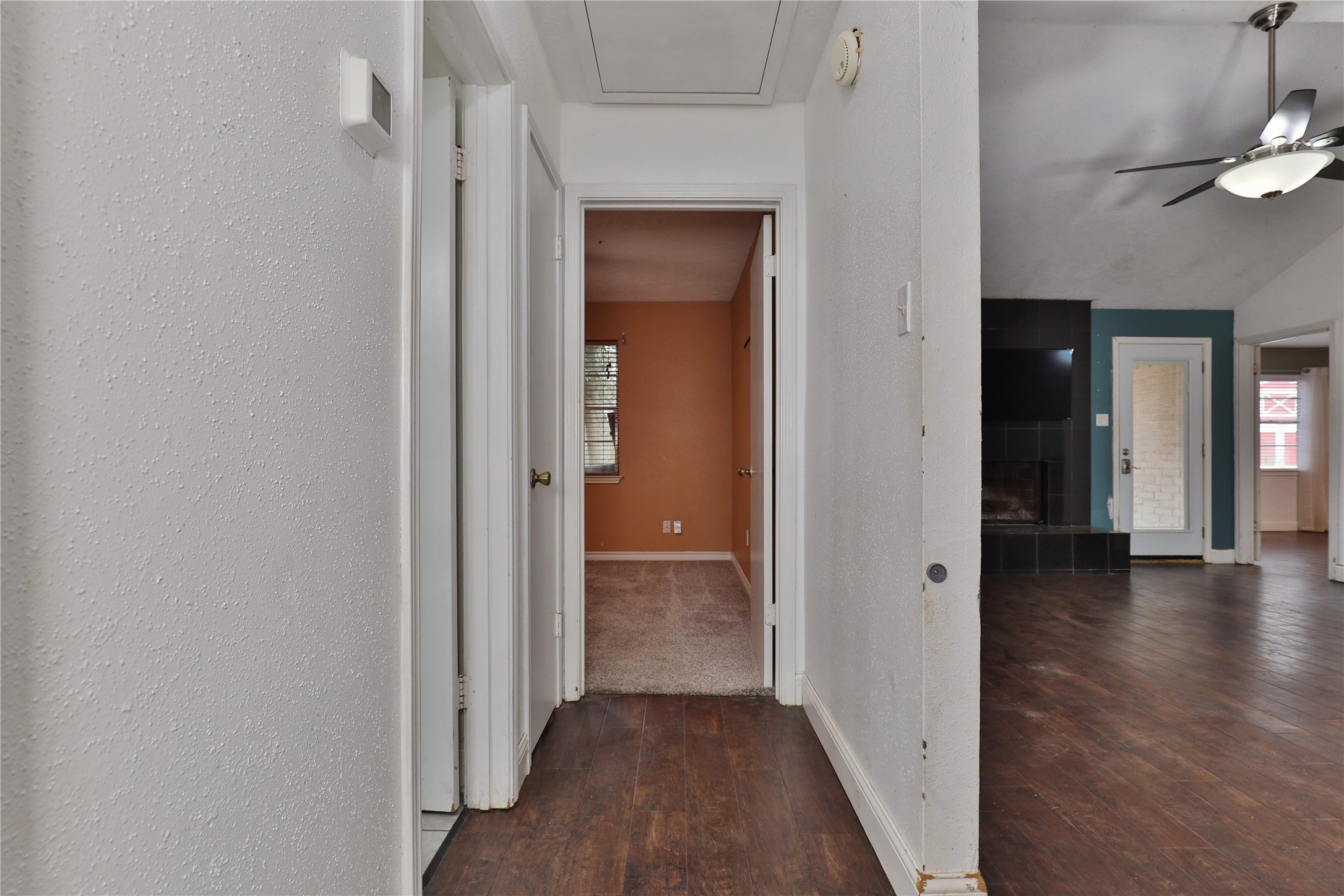 3 Ranch House Loop Angleton, TX 77515 - Photo 18 of 25 a view of a hallway with wooden floor and closet