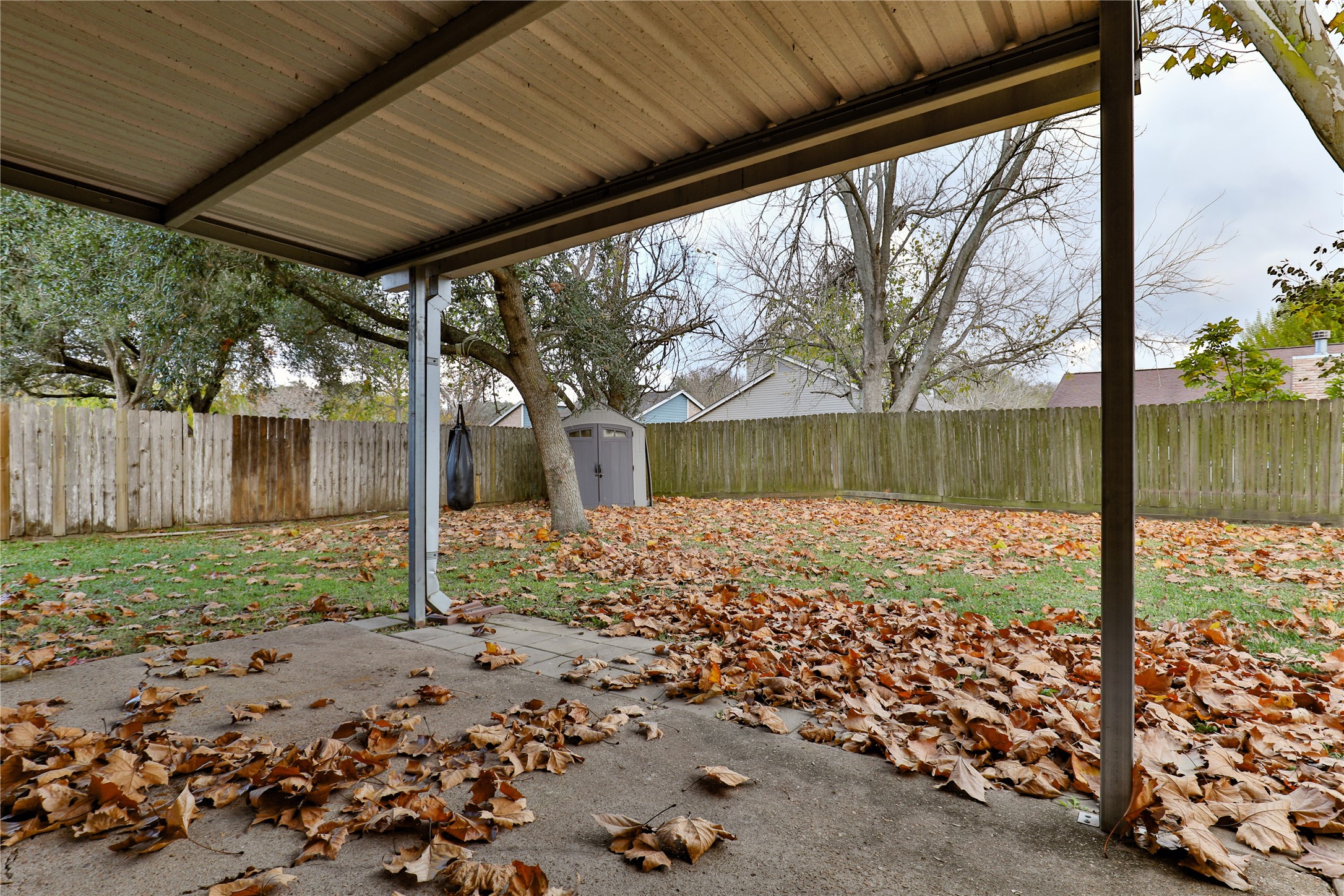 3 Ranch House Loop Angleton, TX 77515 - Photo 24 of 25 a view of a backyard with a garden
