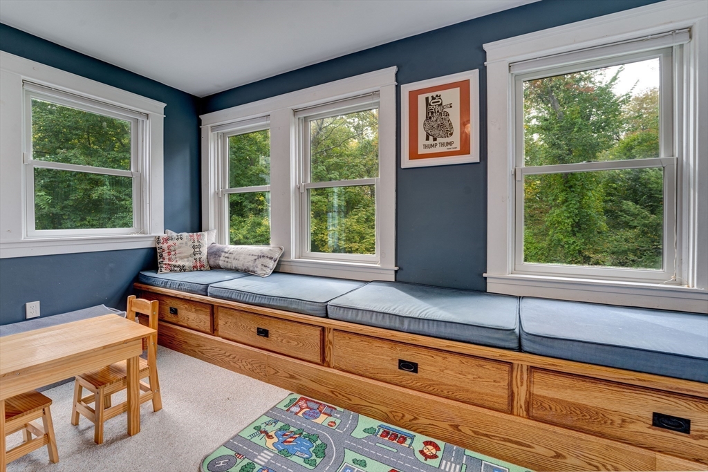 90 Main Street Acton, MA 01720 - Photo 16 of 38 a kitchen with a large window and a sink