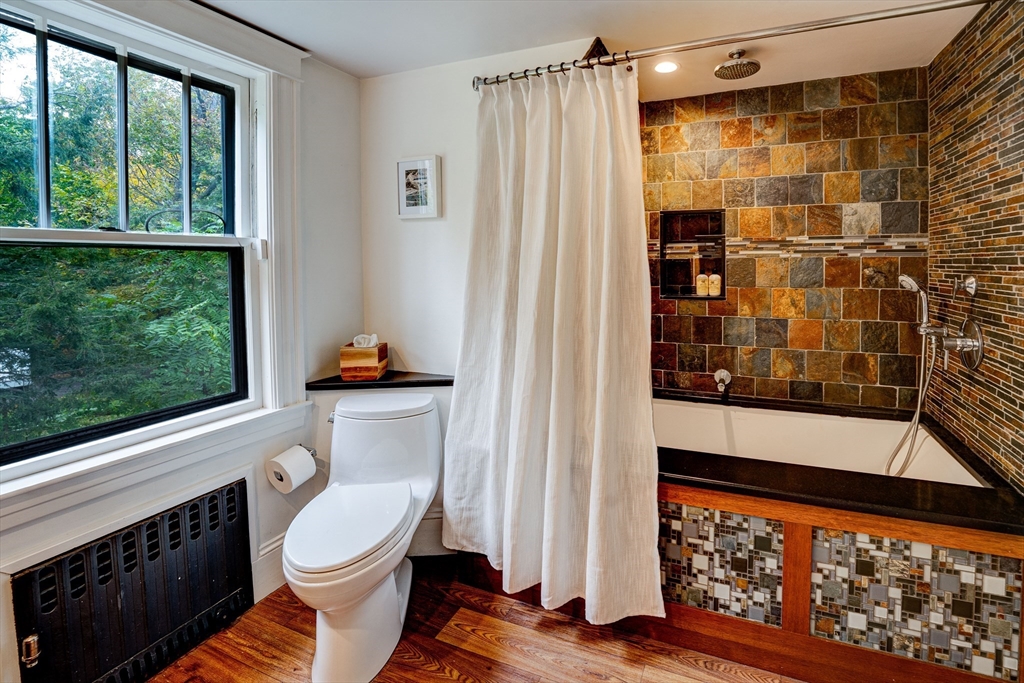 90 Main Street Acton, MA 01720 - Photo 27 of 38 a bathroom with a toilet and a shower