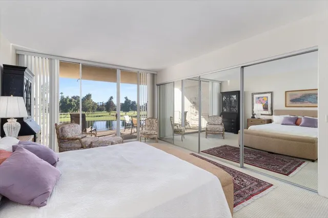 a bathroom with a sink double vanity and a mirror