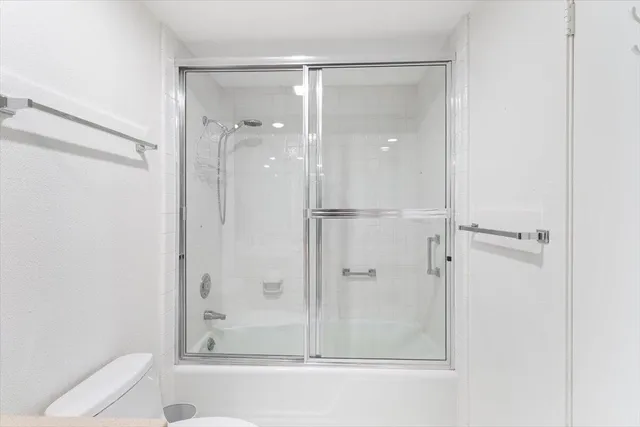 a view of a lake with a building in the background