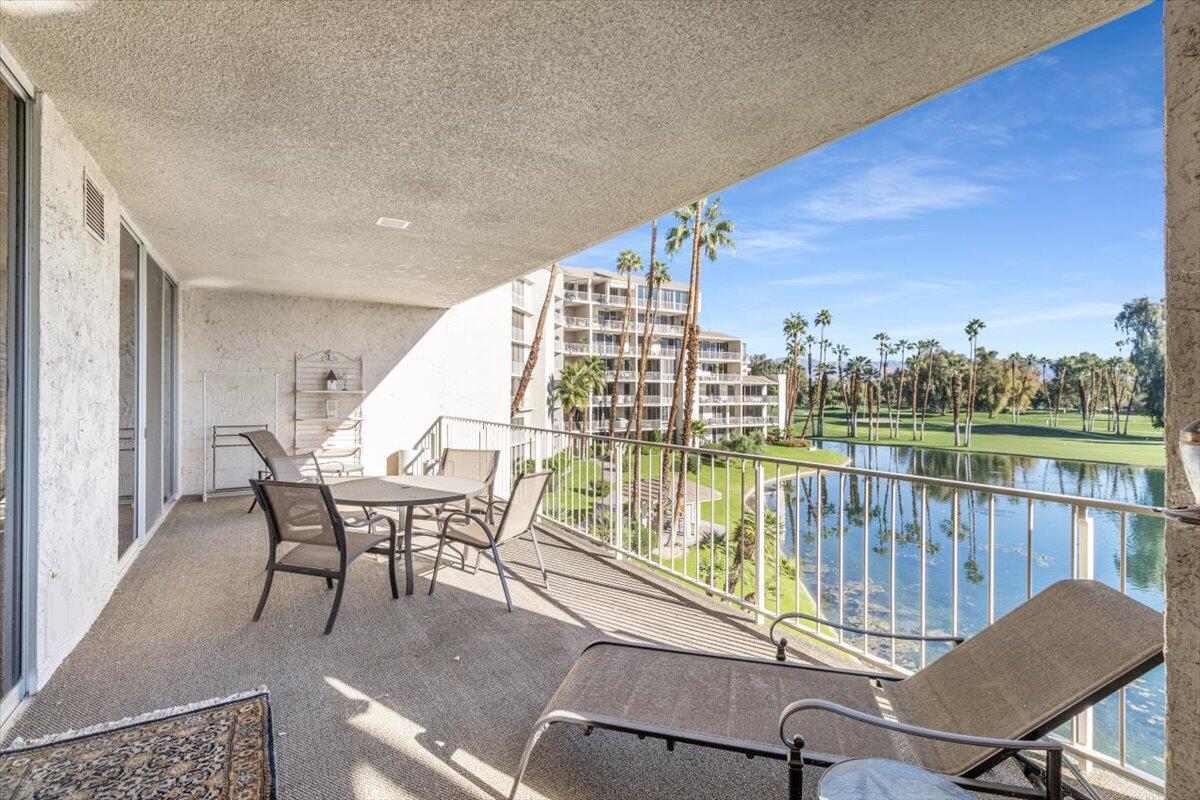 900 Island Drive, Unit 313 Rancho Mirage, CA 92270 - Photo 36 of 62 a view of a chairs and table in balcony