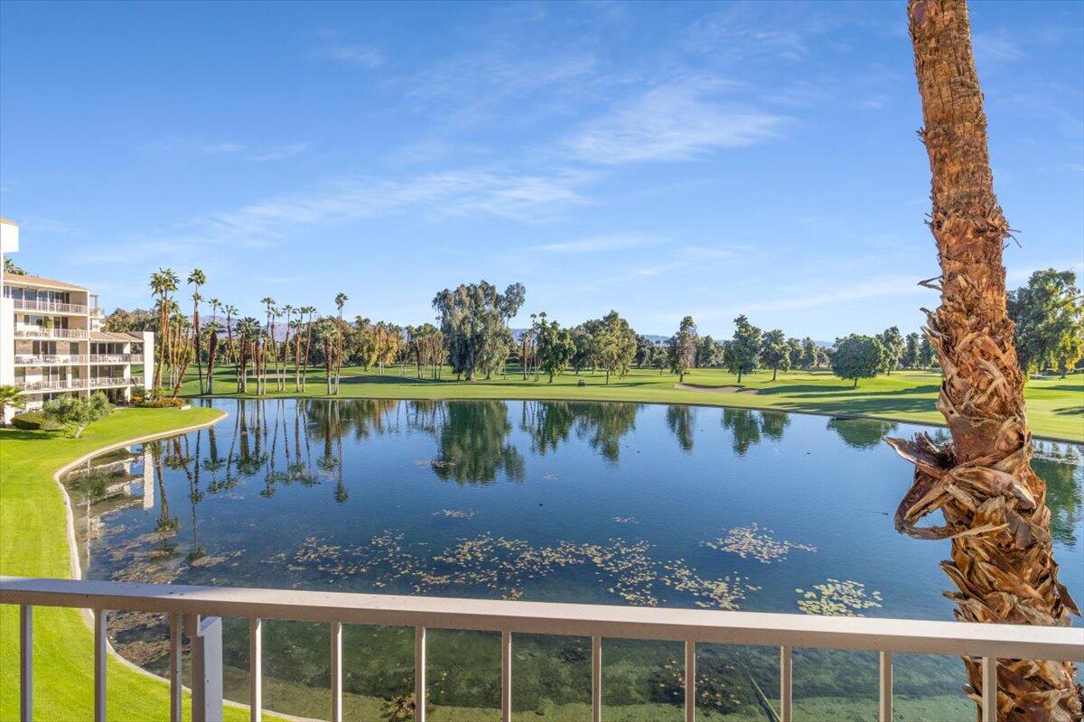 900 Island Drive, Unit 313 Rancho Mirage, CA 92270 - Photo 43 of 62 a view of a lake with a city