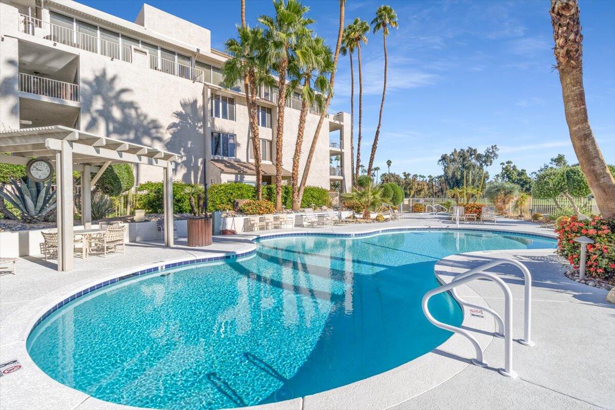 900 Island Drive, Unit 313 Rancho Mirage, CA 92270 - Photo 48 of 62 a view of swimming pool with outdoor seating