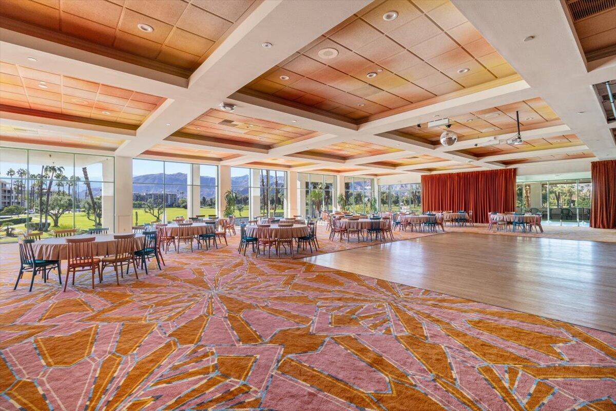 900 Island Drive, Unit 313 Rancho Mirage, CA 92270 - Photo 51 of 62 a view of a swimming pool with outdoor seating