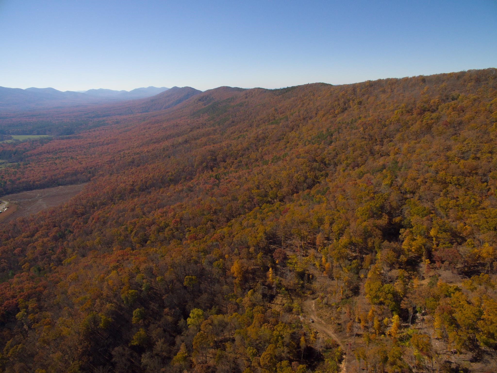0 Big River Road Goshen, VA 24439 - Photo 8 of 14 a view of a mountain range in a cloudy sky