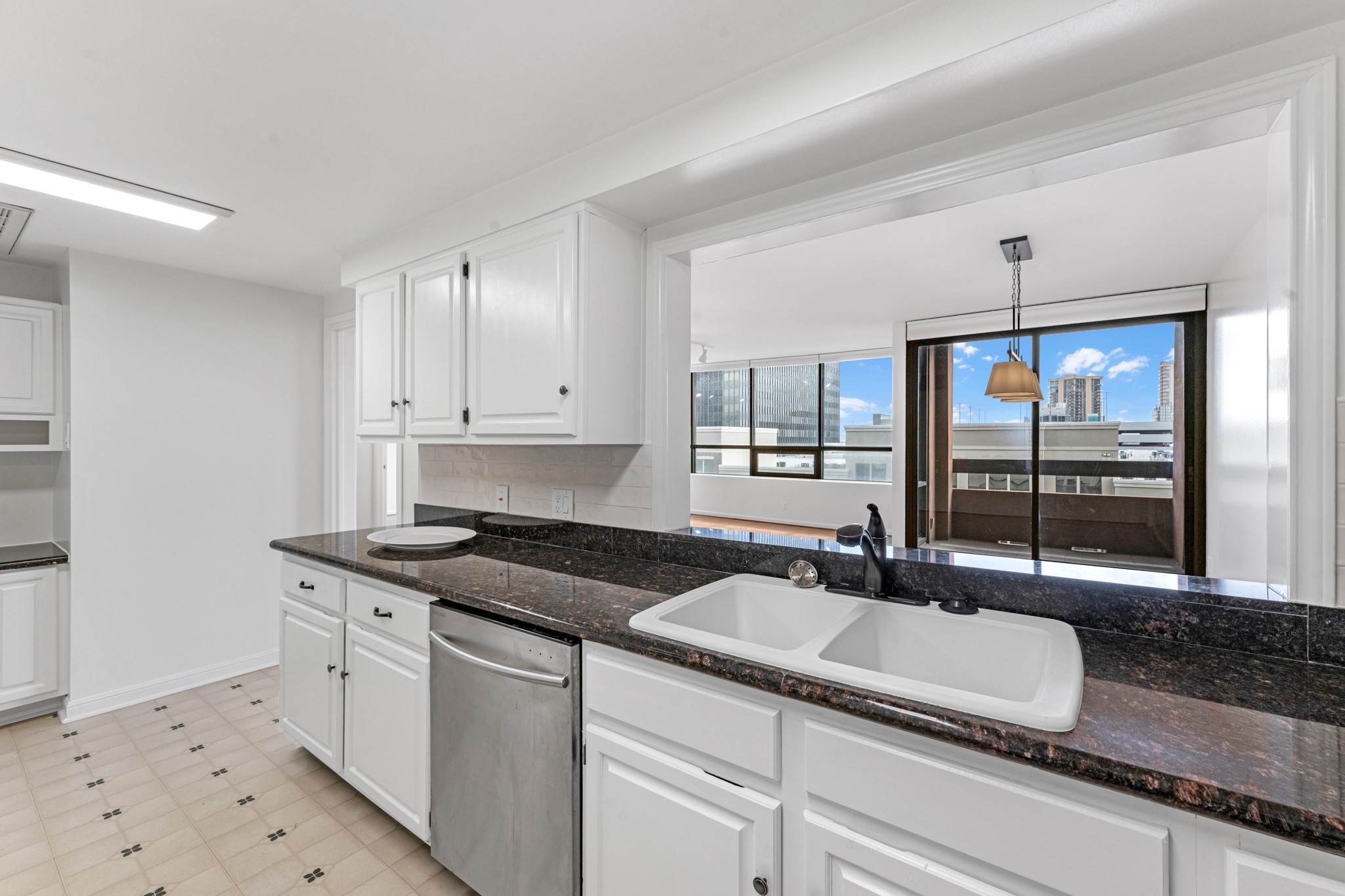 5150 Hidalgo Street, Unit 805 Houston, TX 77056 - Photo 11 of 31 New granite counter tops and double sinks.