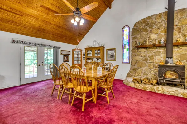 a large room with lots of chairs and mirrors