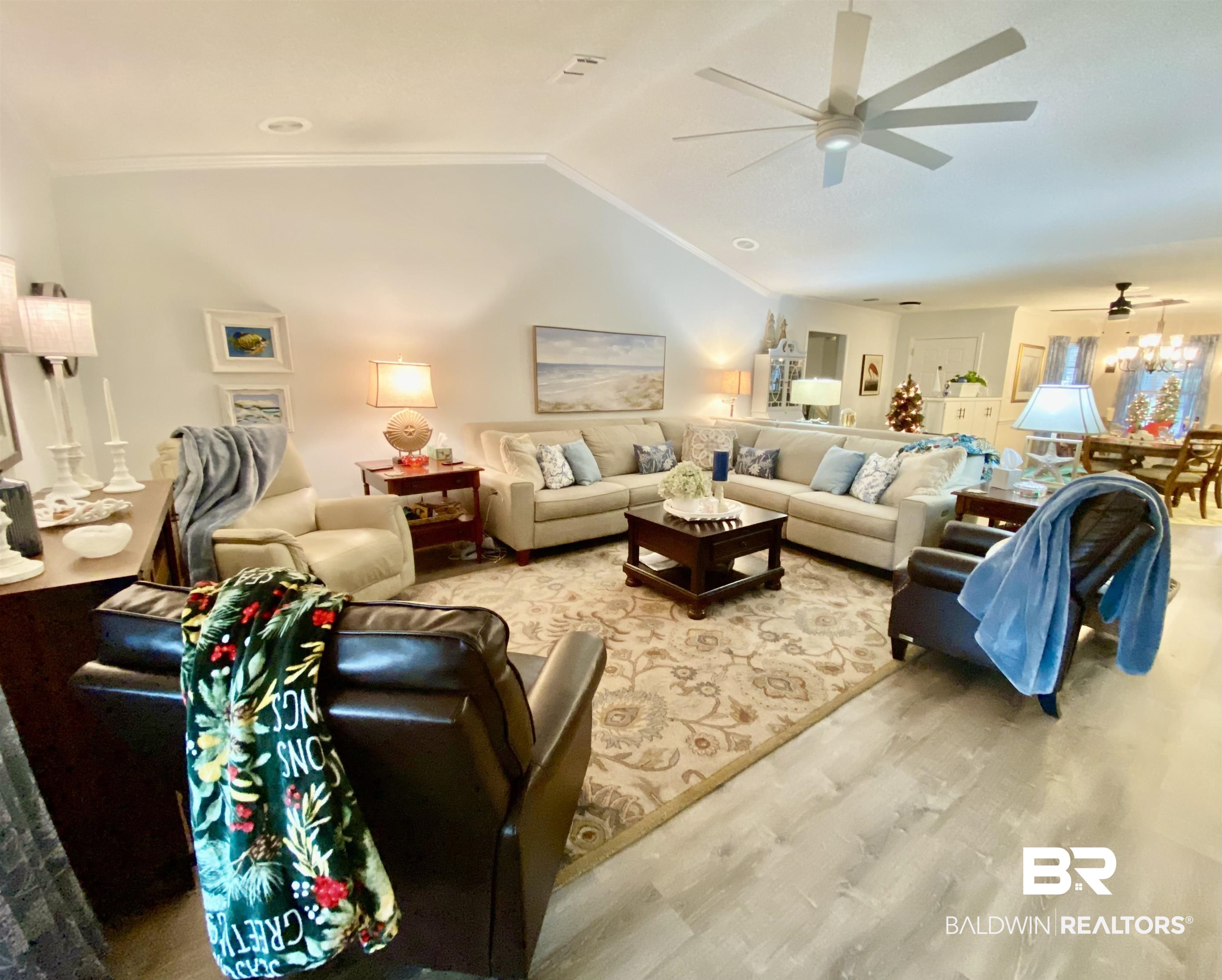 2872 Avenida Alberto Lillian, AL 36549 - Photo 17 of 31 Living room featuring vaulted ceiling and hardwood / wood-style flooring