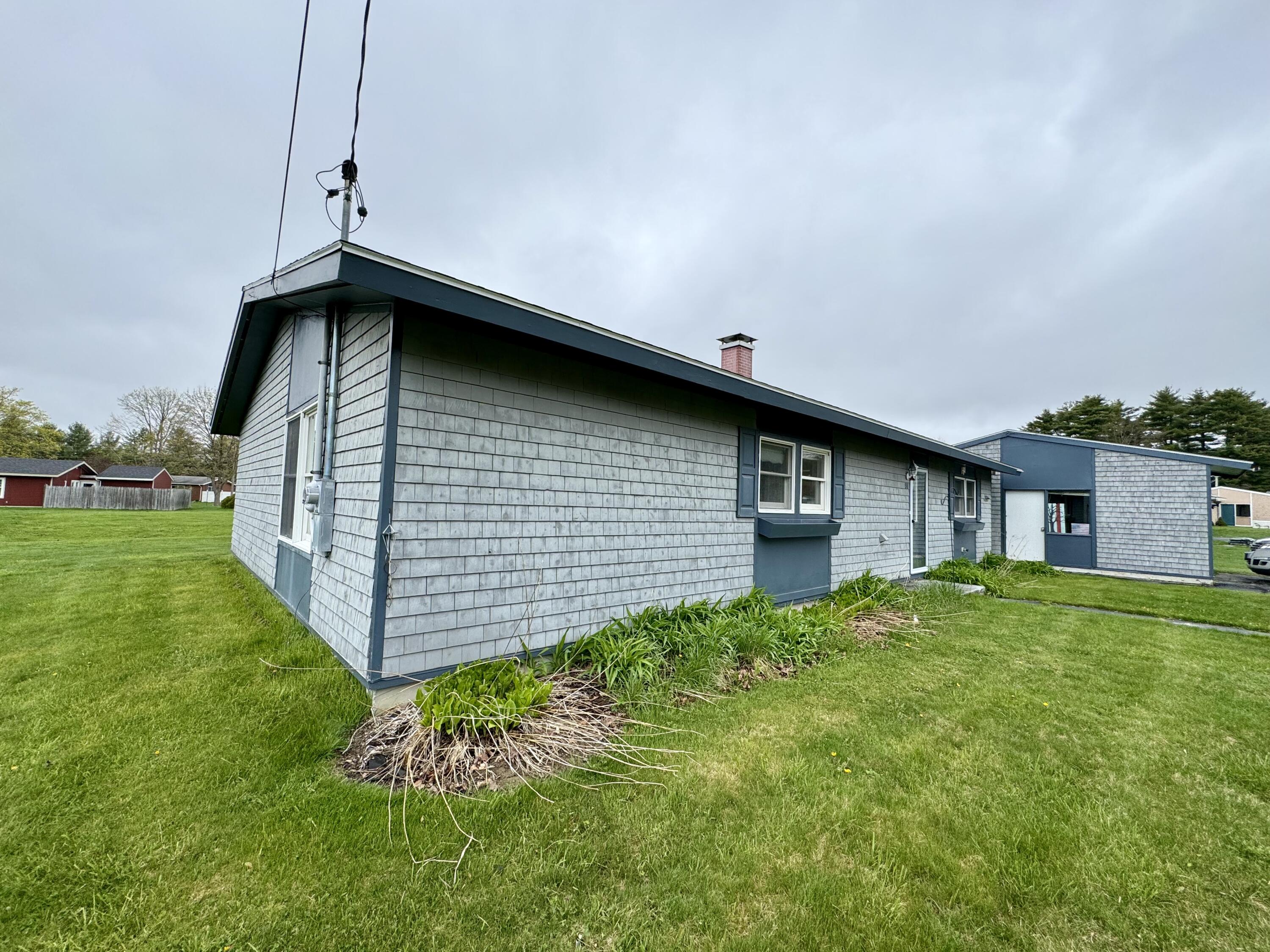 66 Randolph Drive Bangor, ME 04401 - Photo 38 of 42 Side View of home
