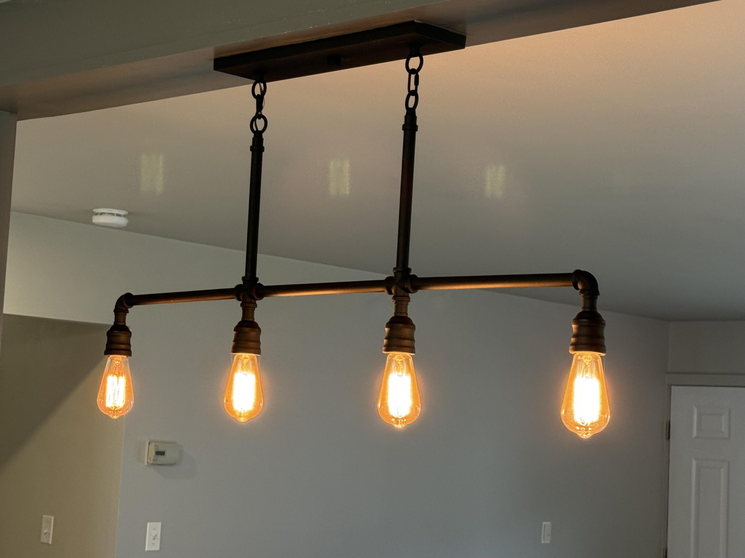 66 Randolph Drive Bangor, ME 04401 - Photo 4 of 42 Edison Lighting