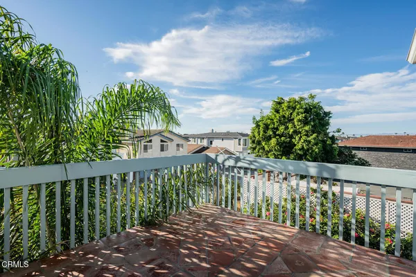 a view of a balcony with a plant