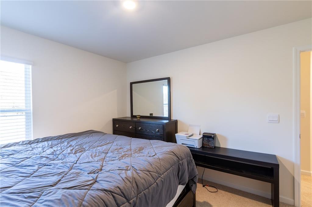 4282 Callum Court Decatur, GA 30034 - Photo 21 of 29 a bedroom with a bed and a window