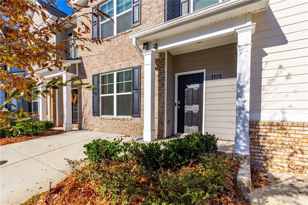 4282 Callum Court Decatur, GA 30034 - Photo 5 of 29 front view of a brick house with a large windows