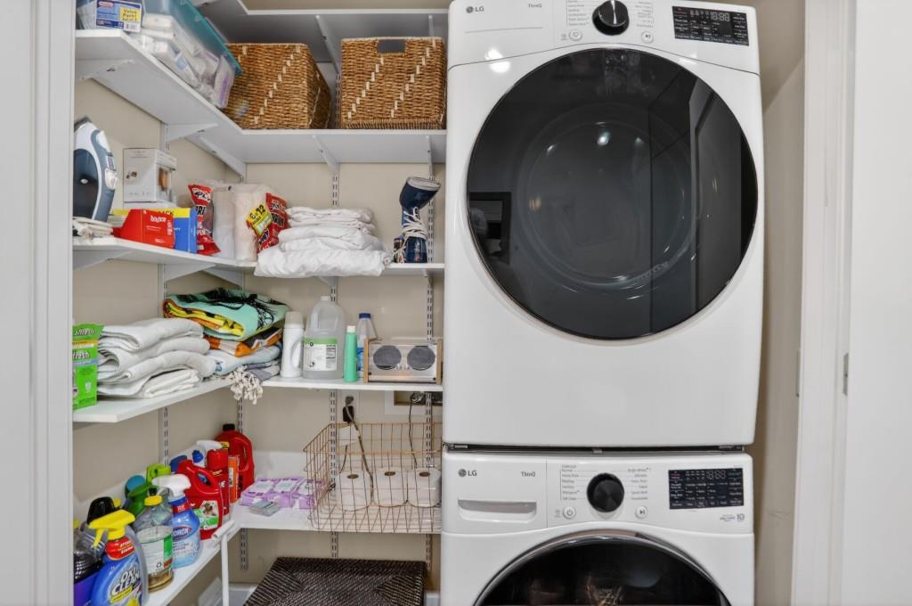905 Juniper Street Northeast, Unit 403 Atlanta, GA 30309 - Photo 13 of 21 a utility room with dryer and washer