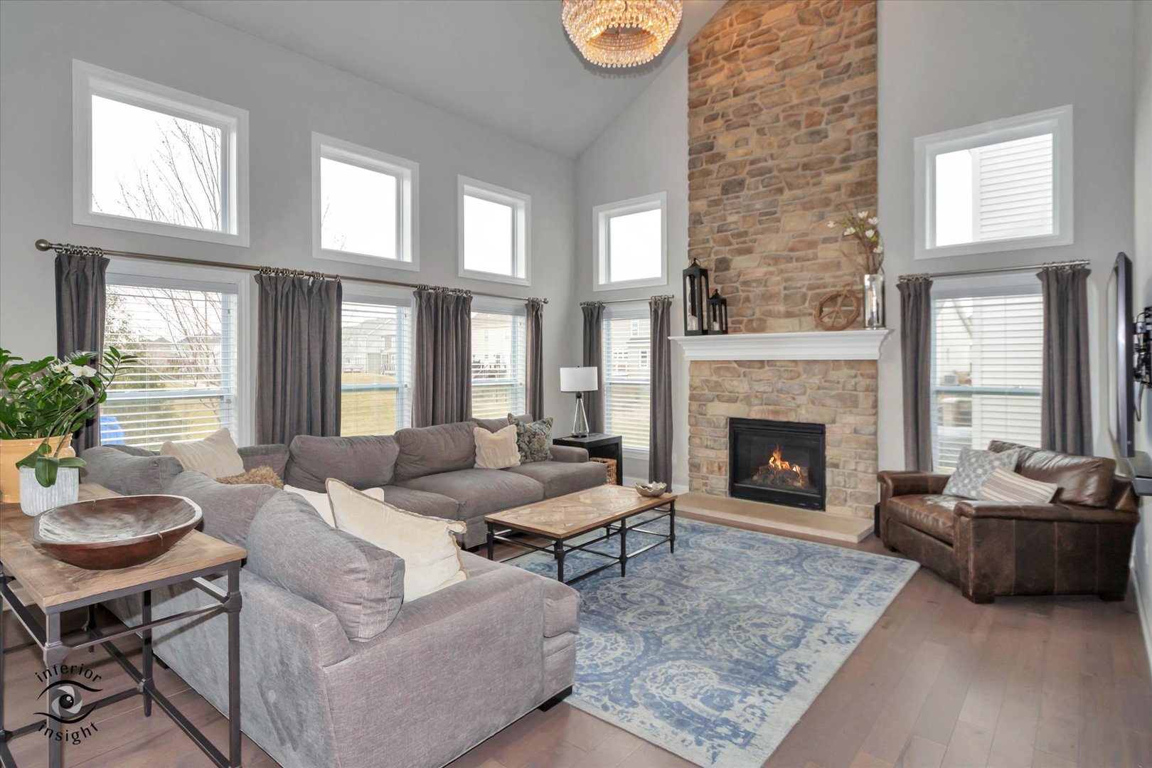 40-w140 Palmer Road Geneva, IL 60134 - Photo 12 of 38 a living room with furniture and a fireplace
