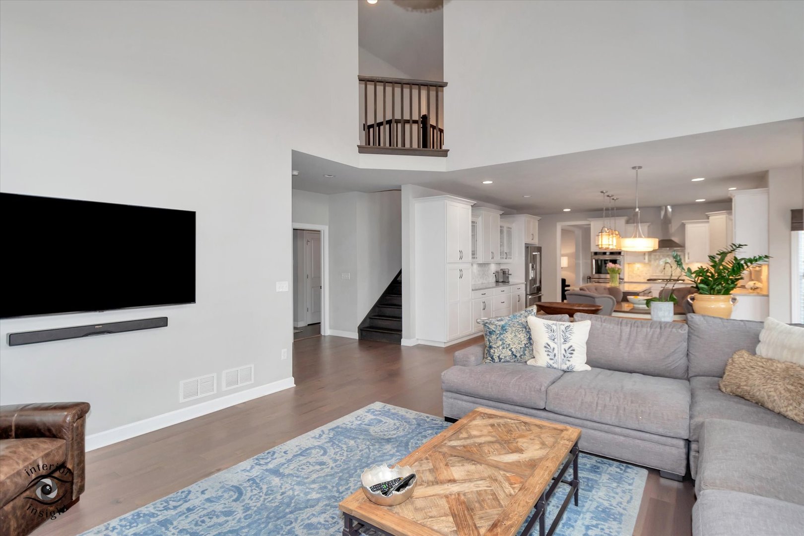 40-w140 Palmer Road Geneva, IL 60134 - Photo 13 of 38 a living room with furniture and a flat screen tv