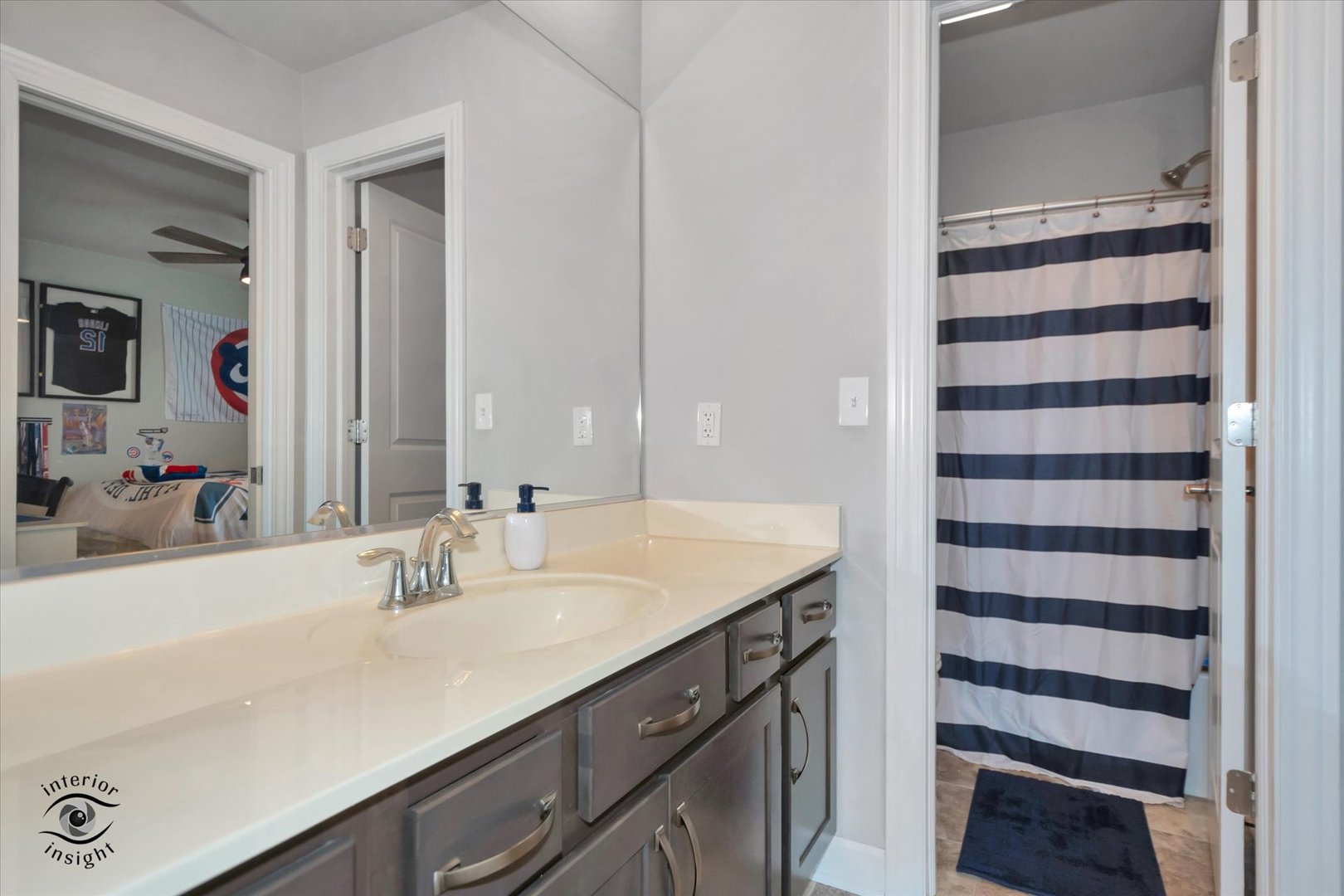40-w140 Palmer Road Geneva, IL 60134 - Photo 25 of 38 a bathroom with a sink and a mirror