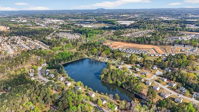 2833 Abbott Lake Road Southwest Lithonia, GA 30038 - Photo 6 of 6 an aerial view of lake and residential houses with outdoor space