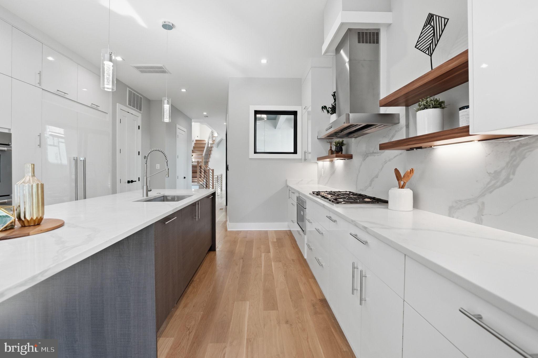 2211 Military Road Arlington, VA 22207 - Photo 20 of 107 Sleek modern kitchen with elegant finishes.